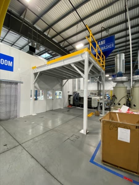 Industrial mezzanine using available vertical space
