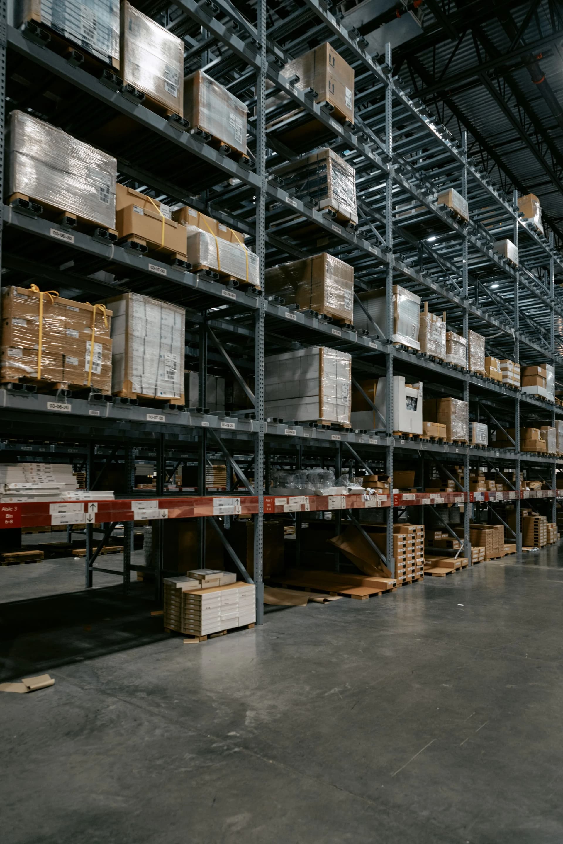 High-capacity warehouse storage arranged in tall, organized rack systems