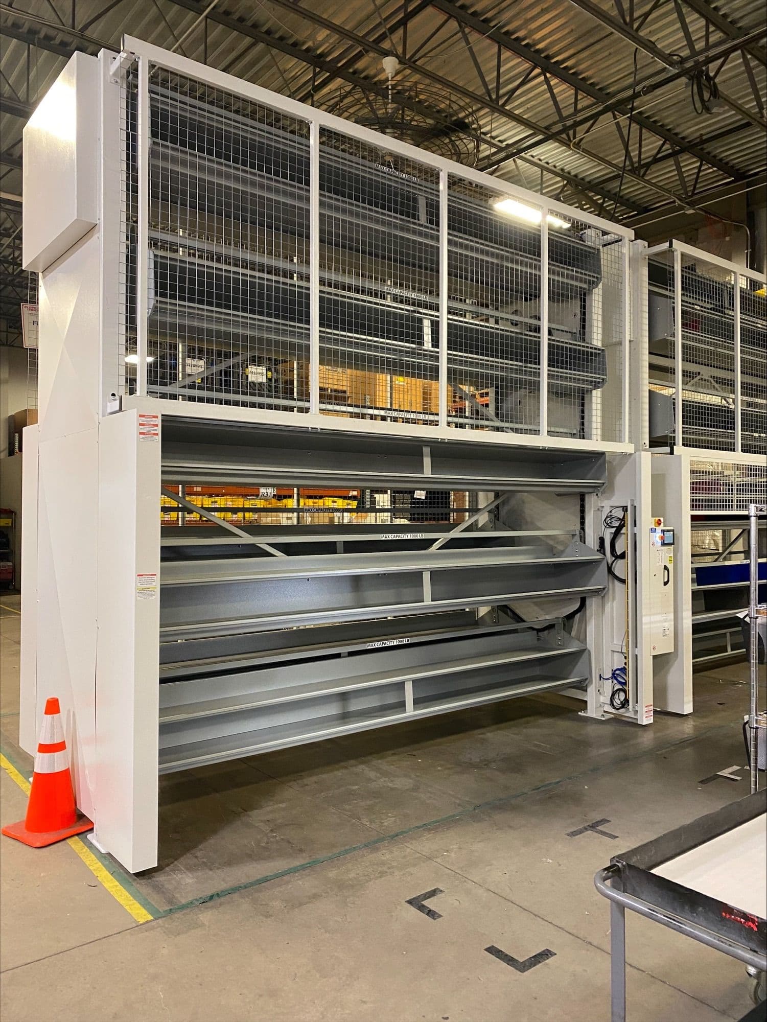 Vertical carousel warehouse automation