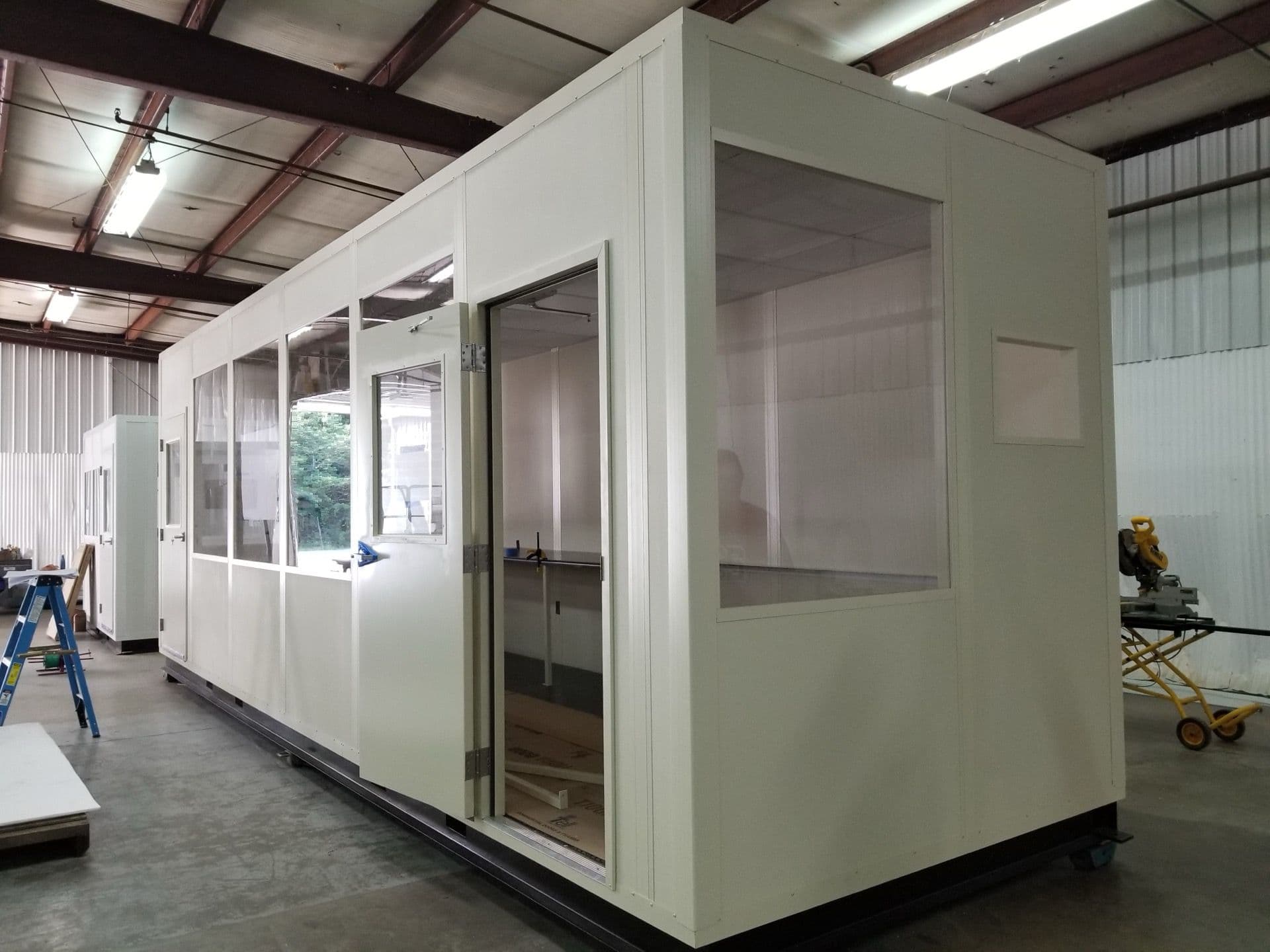 Two-story modular in-plant office installed inside an industrial facility